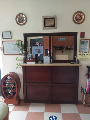 a room with a wooden cabinet with a counter at Hostal Andalucia de Arcos in Arcos de la Frontera