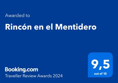 a blue sign with the words rincon en el mercrier at Rincón en el Mentidero in Cádiz