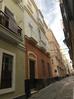 a row of buildings on a city street at Levante by Gades Gestión in Cádiz