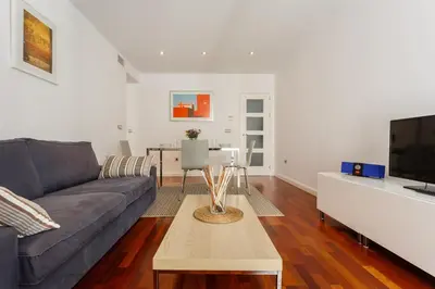 a living room with a couch and a coffee table at Calderón De La Barca in Cádiz