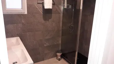 a bathroom with a shower and a sink at GUESTING VELAZQUEZ in Cádiz