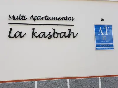 a sign for the institute of anthropology la kashakh on a wall at Multi Apartamentos La Kasbah in Jerez de la Frontera
