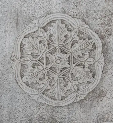 a drawing of a flower design on a wall at Apartamento Sueño de la Caleta in Cádiz