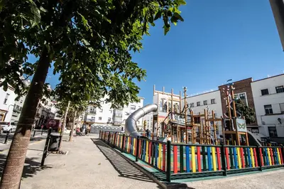 a park with a playground with a slide at Apartamento Sueño de la Caleta in Cádiz