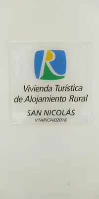 a sign for the university of virginia tulsa de attenuationroidroid at San Nicolás in Algar