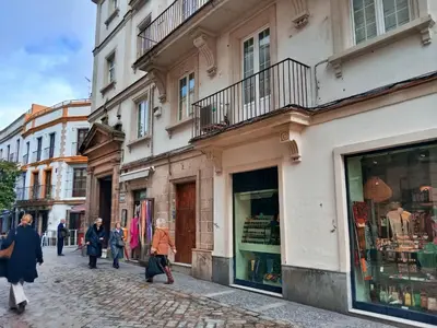 a group of people walking down a street at Estudio Boutique Arenal - Cama buhardilla in Jerez de la Frontera
