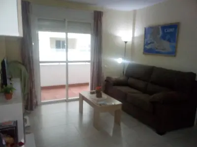 a living room with a couch and a coffee table at Azul Maritimo in Cádiz