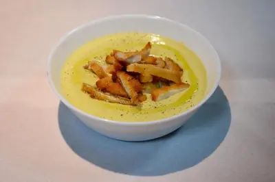 a bowl of soup with french fries in it at Pensión San Marcos in Arcos de la Frontera