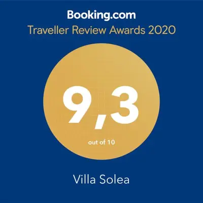 a yellow circle with the number on it at Villa Solea in Chiclana de la Frontera