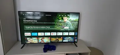 a flat screen tv sitting on top of a table at Apartamento Arbolí in Cádiz