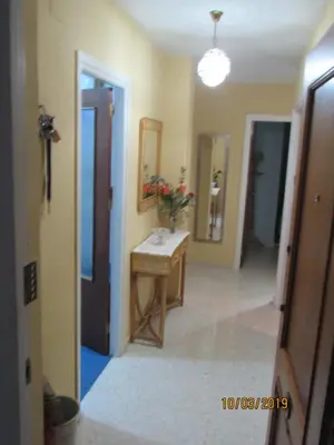 a hallway with a sink in a room at CALLE YERBABUENA 5 in Sanlúcar de Barrameda