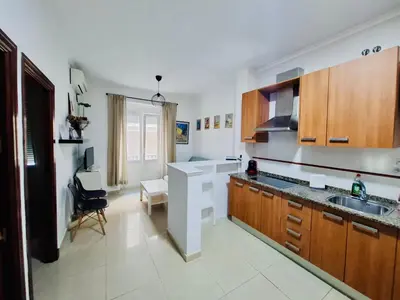 a kitchen with a sink and a counter top at Apartamento Feduchy in Cádiz