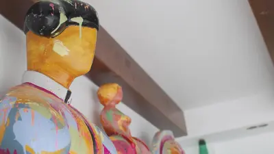 a statue of a mannequin with goggles on its head at 7Escalones in Rota