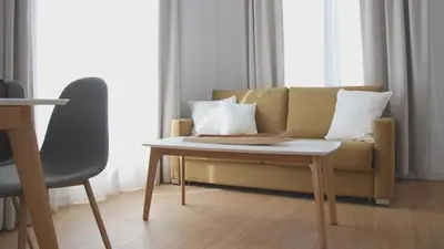a living room with a couch and a coffee table at 7Escalones in Rota