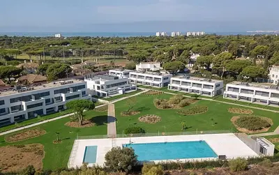 an aerial view of a large building with a swimming pool at Vivienda Vistahermosa Playa in El Puerto de Santa María