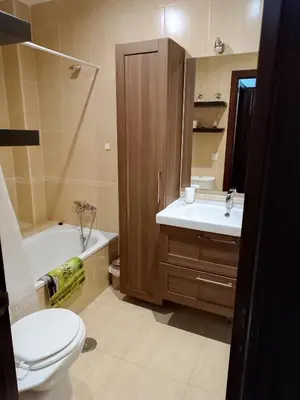 a bathroom with a toilet and a sink and a tub at Playa caleta 7 min, wifi, catedral, centro in Cádiz