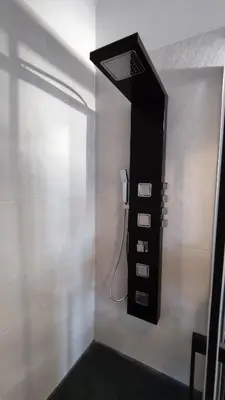 a bathroom with a phone on the wall at LA BENDITA LOCURA in El Puerto de Santa María