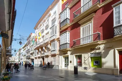 a group of buildings on a city street at Atico del ROMANTICO Gaditano by Cadiz4Rentals in Cádiz