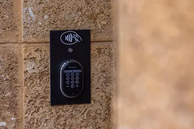 a remote control on the side of a brick wall at Candelaria10 in Cádiz