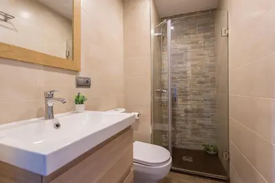 a bathroom with a sink and a shower at San Jose 2 baños in Cádiz