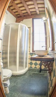 a bathroom with a sink and a shower at Casa Boutique Sanlucar in Sanlúcar de Barrameda