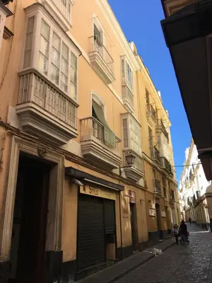 a building on the side of a street at Casa Conchita in Cádiz