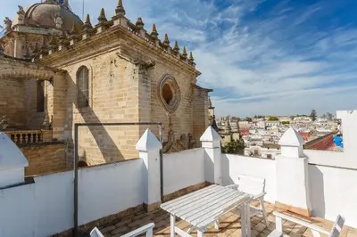 a bench on the roof of a building at Suite Catedral Jerez in Jerez de la Frontera