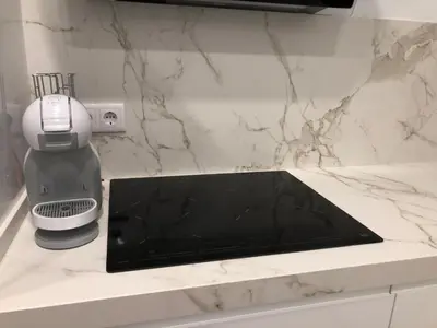 a kitchen counter with a hair dryer on it at Jano PuertaTierra in Cádiz
