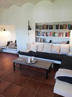 a living room with a couch and a coffee table at Casa MariSol in Arcos de la Frontera