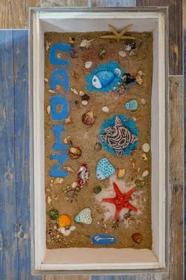 a picture of a beach in a picture frame at Noah House city center - Historic center in Cádiz