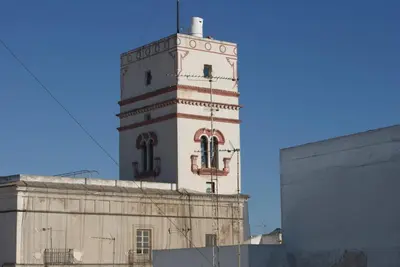 a tall tower on top of a building at CDZ - Ático Tavira in Cádiz