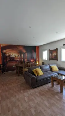 a living room with a couch and a table at Apartamento Jerez Centro in Jerez de la Frontera