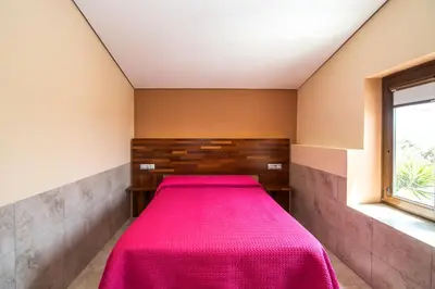 a living room with two couches and a coffee table at El Caseron de Conil & Spa in Conil de la Frontera