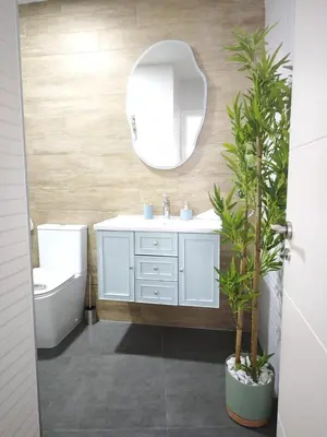 a bathroom with a white sink and a mirror at Apartamento El Tanguillo Little Apartments in Cádiz