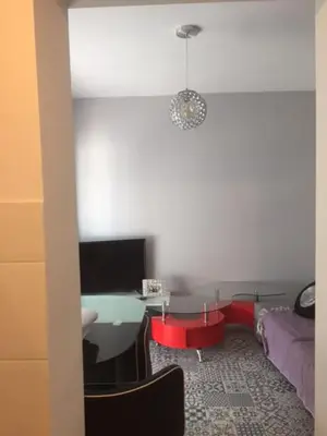 a room with a desk with a computer and a bed at Modern Seaside Apartment 700 mt from beach in El Puerto de Santa María