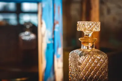 a close up of a glass bottle with a stopper at Semiloft Romantico Catedral con soleada azotea comunitaria in Jerez de la Frontera