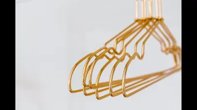a bunch of gold bars on a white background at Apartamento semi-industrial palacio Castilla in Jerez de la Frontera