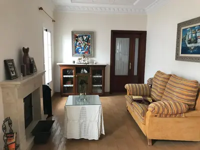 a living room with a couch and a coffee table at Bahía blanca SM in Cádiz
