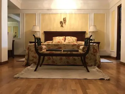 a bedroom with a bed with a couch in it at Bahía blanca SM in Cádiz