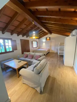 a kitchen with blue cabinets and a sink and a microwave at Casa independiente con piscina y pista deportiva privadas in El Puerto de Santa María