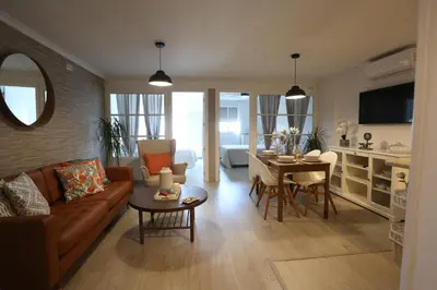 a living room with a couch and a table at Duque de Boliches in Arcos de la Frontera
