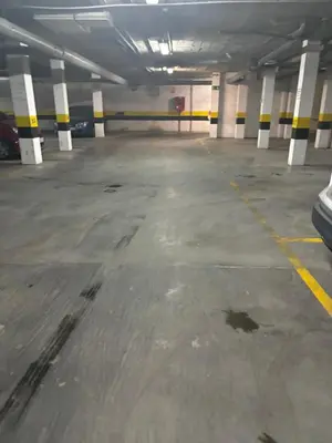 an empty parking garage with a car parked in it at Fumiko in Sanlúcar de Barrameda