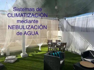 a tent with chairs and a table in a room at Casa Ana in Sanlúcar de Barrameda