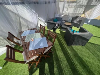 an overhead view of a patio with a table and chairs at Casa Ana in Sanlúcar de Barrameda