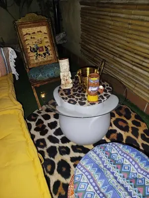 a room with a bed and a table with food on it at Indo en OGGOB com in Chiclana de la Frontera
