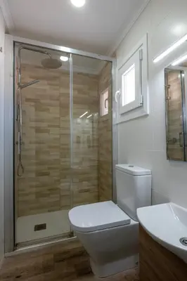 a bathroom with a shower and a toilet and a sink at El mirador del Mentidero in Cádiz