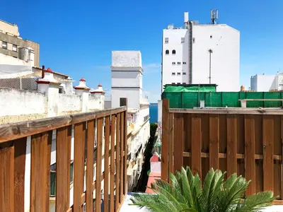 a view of the city from a balcony at El Palomar de Menacho in Cádiz