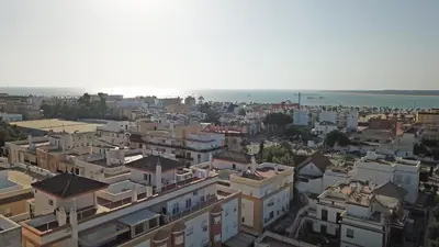 an aerial view of a city with buildings at Apto Terrazas 3 Rooms 2 baños Cabildo Playa Parking in Sanlúcar de Barrameda