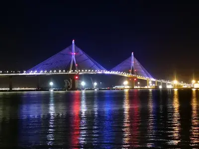 a bridge over a body of water at night at HORIZONTE Sunny Home by Cadiz4Rentals in Cádiz