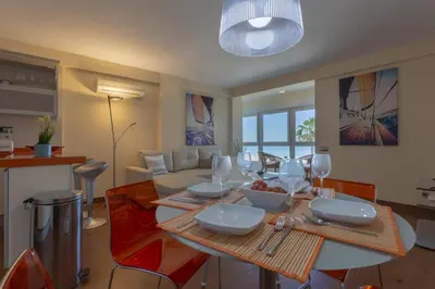 a living room with a table with wine glasses on it at HORIZONTE Sunny Home by Cadiz4Rentals in Cádiz